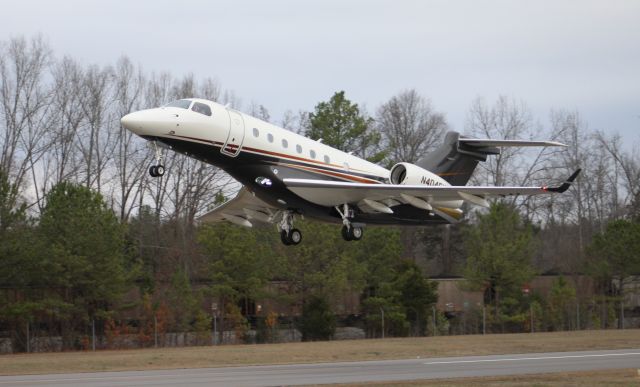 Embraer Legacy 550 (N404FX) - An Embraer 550 Legacy departing Runway 22 at Word Field, Scottsboro Municipal Airport, AL - January 25, 2017. 