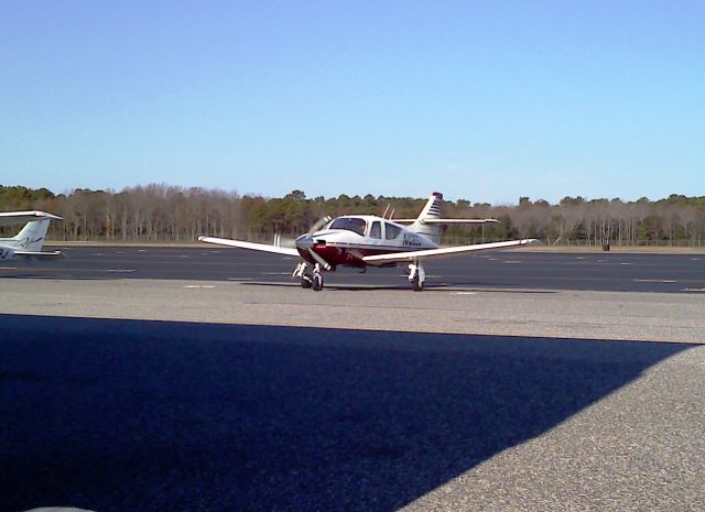 Rockwell Commander 114 (N1088J) - Pulling into the FBO @ Cape May After Landing RWY 28