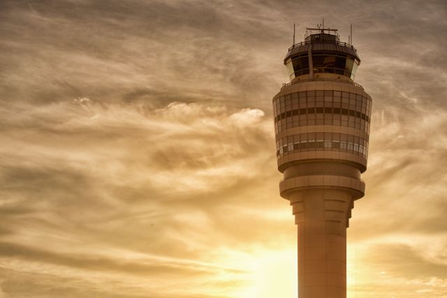 — — - KATL tower at sunrise