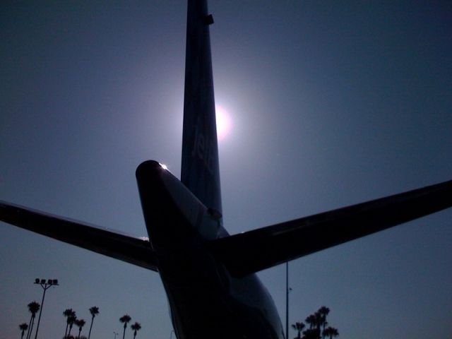 Embraer ERJ-190 (N247JB) - E190 tail, the sun casts a nice shadow on this bird. Courtesy of JetBlue Jae