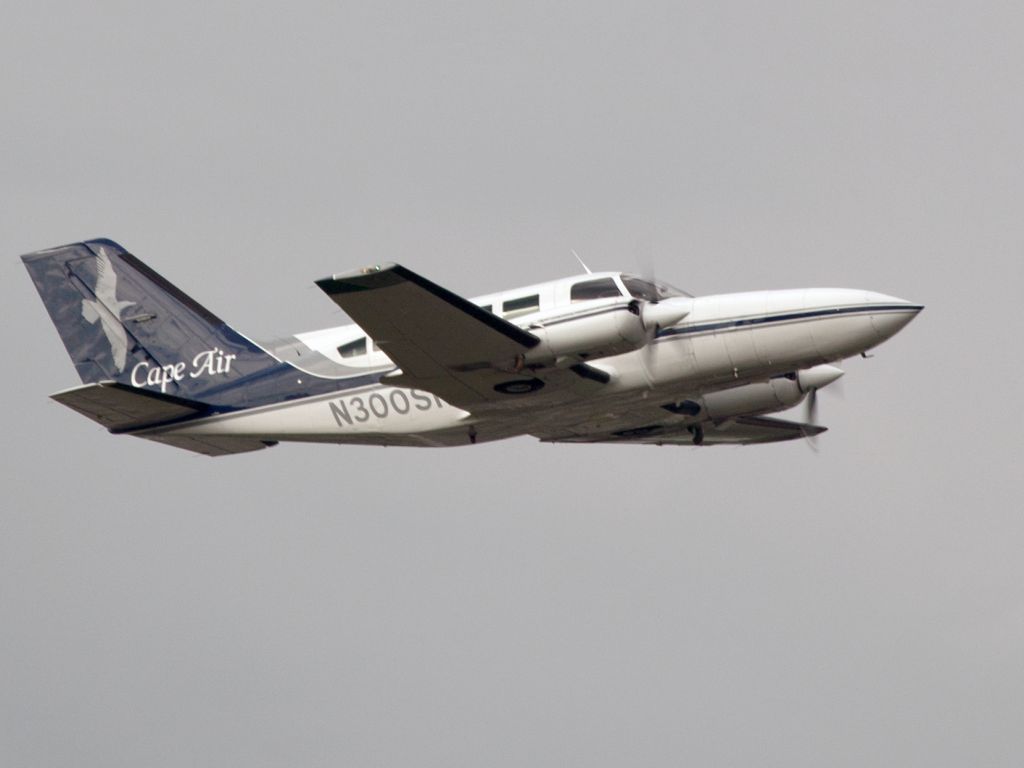 Cessna 402 (N300SN) - Take off on a busy summer day.