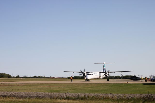 de Havilland Dash 8-400 (C-FHEN) - Flight 3242 prepares to depart Brandon, Manitoba.