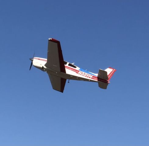 Beechcraft Bonanza (33) (N33YM) - Departing E79