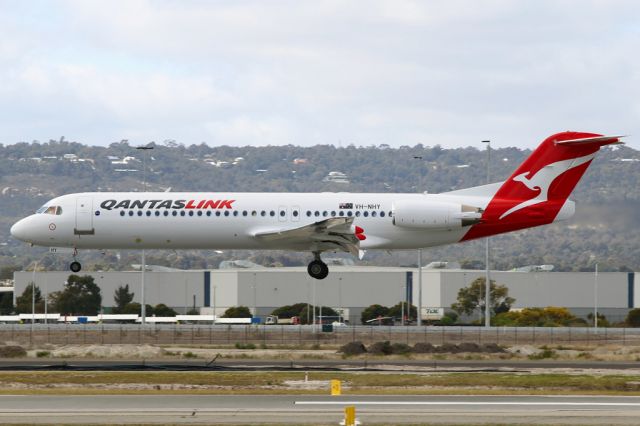 Fokker 100 (VH-NHY) - The first QantasLink branded Fokker 100 aircraft is operated out of Perth by Network Aviation. Yankee about to land on RWY 03 from Tropicana.