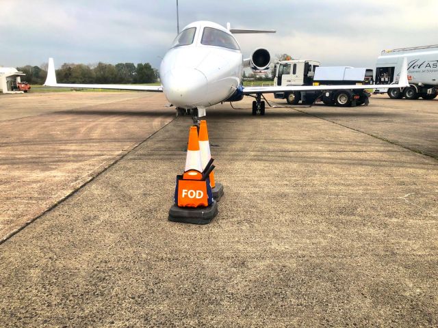 Learjet 40 (C-FEMF) - Parking on the GAT at Belfast International EGAA/BFS on a quick turn 