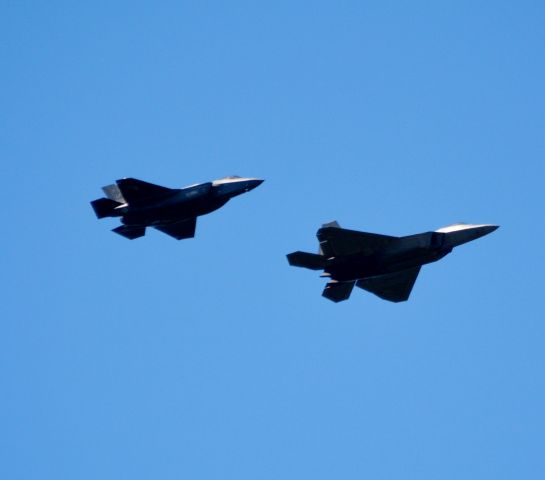 — — - F-22 and F-35 landing at Cleveland Hopkins.