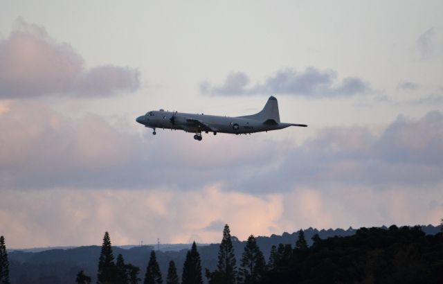 — — - While we were leaving Hilo on the ship; Pride of America, a USN Lockheed Orion was doing touch and gos!