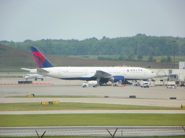 Boeing 777-200 (N863DA) - Delta 777 sitting at CVG in 2020 chartering the LA Chargers This 777 was the first to be retired when delta announced the whole fleet being retired by the end of 2020