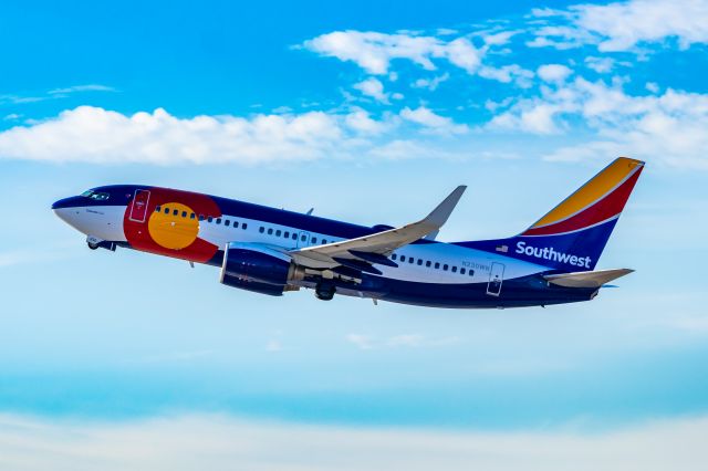 Boeing 737-700 (N230WN) - Southwest Airlines 737-700 in Colorado One special livery taking off from PHX on 10/22/22. Taken with a Canon 850D and Tamron 70-200 G2 lens.