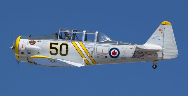 N4763 — - This is the first photo of N4763, Abracadabra, to be presented in the FA gallery, and it captures pilot Rob Sandberg getting the AT-6C airborne to participate in a T-6 heat race at the 2015 National Championship Air Races at KRTS (Reno Stead Airport).