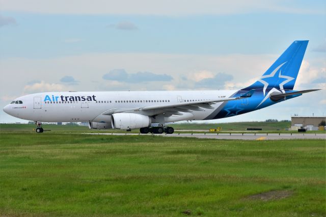 Airbus A330-200 (C-GUBF) - Air Transat Airbus A330-243 departing YYC on June 23.