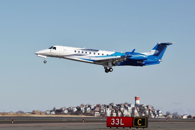 Embraer ERJ-135 (N865LS) - A RWY33L arrival from KOCF on the coldest day of the year.  3rd photo ever uploaded of N865LS uploaded on FlightAware.Com !