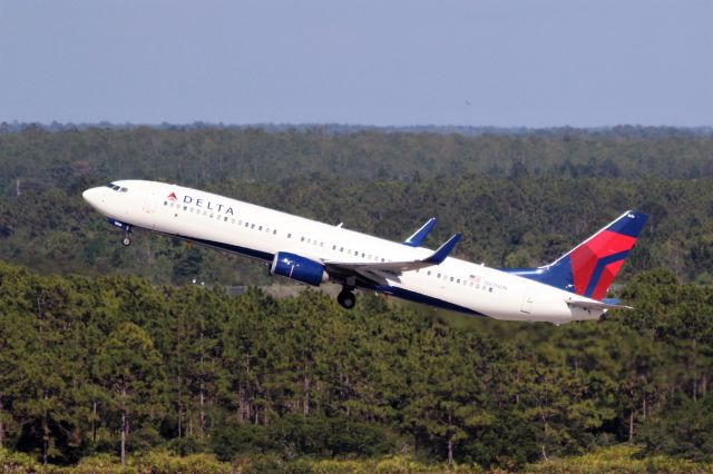 Boeing 737-900 (N830DN) - Delta Airlines (DL) N830DN B737-932 ER [cn31940]br /Orlando (MCO). Delta Airlines flight DL1839 departing to New York La Guardia (LGA).br /Taken from MCO Terminal Top Parking Garagebr /2017 05 15  a rel=nofollow href=http://alphayankee.smugmug.com/Airlines-and-Airliners-Portfolio/Airlines/AmericasAirlines/Delta-Airlines-DLhttps://alphayankee.smugmug.com/Airlines-and-Airliners-Portfolio/Airlines/AmericasAirlines/Delta-Airlines-DL/a