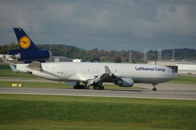 Boeing MD-11 (D-ALCK) - EXITING FROM 36R to taxi way