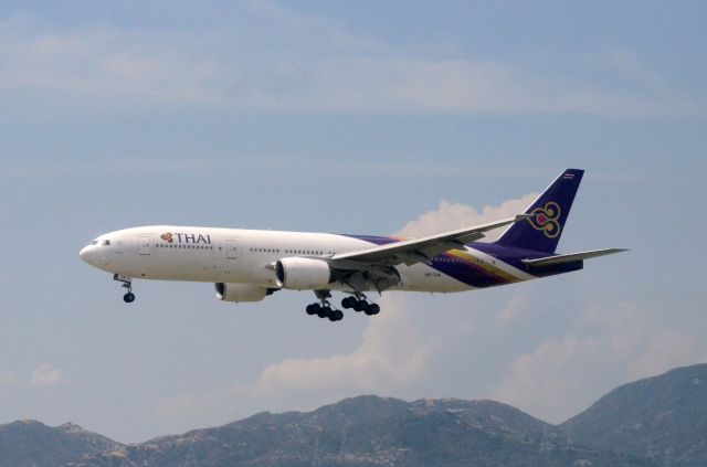 Boeing 777-200 (HS-TJA) - Airline: Thai Airways International (TG/THA); Airport: Hong Kong International Airport (HKG/VHHH); Camera: Nikon D7000; Date: 4 July 2011