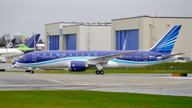 Boeing 787-8 (VP-BBR) - BOE740 taxis to parking on completion of its maiden flight on 11/6/14. (ln 211 / cn 37920). The aircraft is using temporary registration #N1789B which appears to have partially peeled off this side during the flight. This is the first DreamLiner for Azerbaijan Airlines.