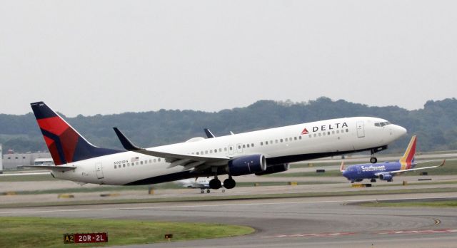 Boeing 737-700 (N901DN) - A Delta B-737 takes off on runway 20R at Nashville Tennesee. 2021-10-06.