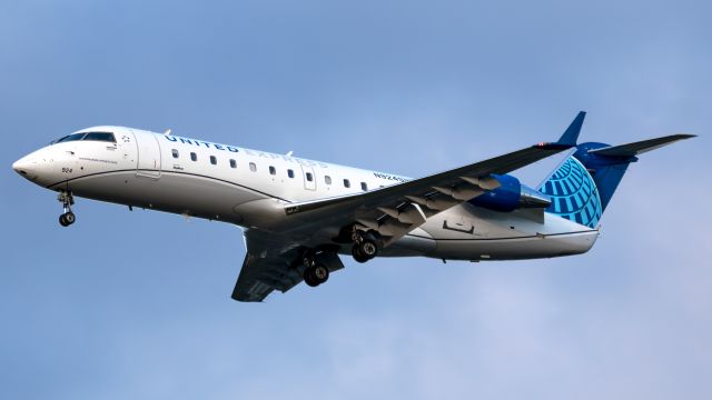Canadair Regional Jet CRJ-200 (N924SW) - Arriving from IAH during the last bits of sunlight available. It has been some time since I've seen one of these little workhorses wearing a major carrier livery!Very nostalgic!