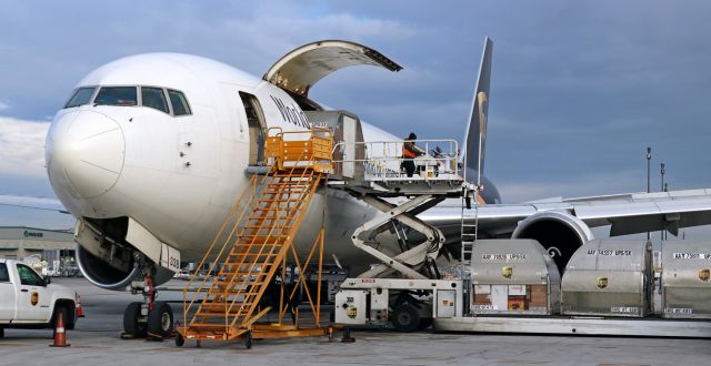 BOEING 767-300 (N338UP) - This December snap captured UPS personnel loading holiday packages to be transported to the east coast.