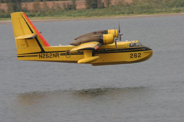 N262NR — - Canadair CL-215 Flying Boat Scooping Up Water on the Columbia River by Mt. Hood on Monday Aug. 15 2014.