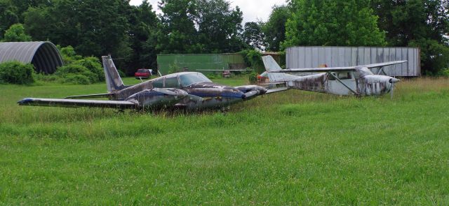Piper PA-30 Twin Comanche (N7047Y) - JENKINS AIRPORT-WYOMING, DELAWARE, USA-JULY 12, 2025: Seen by RF at this small, rural airport was this twin engine Piper Comanche. Jenkins Airport, located in Kent County Delaware, was established in 1950 and has a single turf runway (12/30) that is approximately 2035 ft long and 70 ft wide. It is a privately owned-public use facility. The owner also conducts an aircraft salvage business at the airport, hence the many airplanes in various conditions.