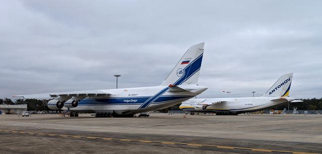 Antonov An-12 (RA-82047) - Two AN-124s resting overnight...which livery suits this plane best? UR-82009 and RA-82047