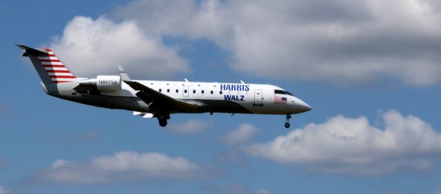 Canadair Regional Jet CRJ-200 (N907SA) - About to touch down is this 2004 Tri-State Charter Mitsubishi Canadair Regional Jet 200ER in the Autumn of 2024.