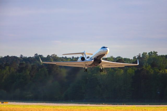 Gulfstream Aerospace Gulfstream V (N996GA) - N996GA is a 2000 Gulfstream GV seen here departing Augusta Georgia's regional airport shortly after the conclusion of the 2023 Masters golf tournament. I like this photo for two reasons. Seeing this big bird stretching it massive wings was impressive and the evening sun was lighting up the grass and wild flowers with some brilliant colors. I shot this with a Canon 5Dsr and a Canon 500mm lens with a 1.4x extender on it making the lens' focal length 700mm. Camera settings were 1/8000 shutter, F5.6, ISO 3200. Please check out my other aviation photography. Votes and positive comments are always appreciated. Questions about this photo can be sent to Info@FlewShots.com 