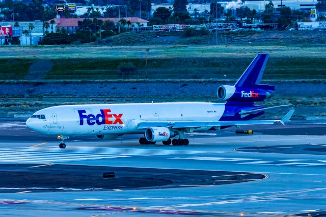 Boeing MD-11 (N591FE) - A FedEx MD11 taxing on a cloudy morning at PHX on 1/17/23. Taken with a Canon R7 and Tamron 70-200 G2 lens.