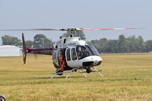 Bell 407 (N118SP) - State Patrol Heli preparing to take off at Flying Cloud Air Expo 2023