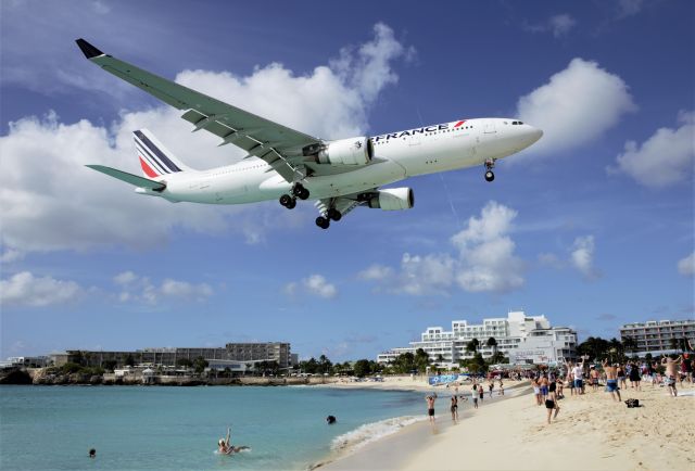 Airbus A330-200 (F-GZCL) - Air France Airbus A330-203 flying lights while over the beach for landing at St Maarten.