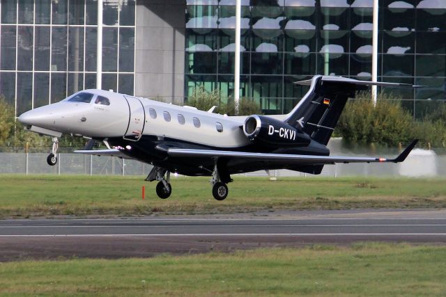 Embraer Phenom 300 (D-CKVI) - Airborne off rwy 24 on 22-Oct-21 heading for LPPT.