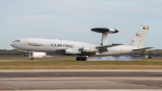 77-0351 — - E-3 AWACS, 77-0351, the 552nd ACW's tail flash, does a smoky touch and go at KEFD on November 17, 2022