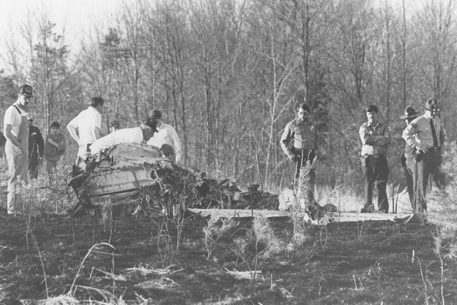 N18879 — - Rescuers look over remains of this Beech C23 which crashed and burned in Semora N.C.   3-20-87.Three Averett University students aboard..3 Fatal.Had just flown out of Danville Regional Airport in Danville Va...NTSB-ATL87FA088 .