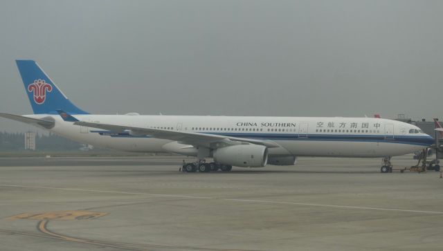 Airbus A330-200 — - CSN A330-200 at gate in Chengdu.