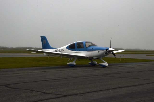 Cirrus SR-20 (N28PF) - On the ground at the perpetually foggy Nantucket airport.