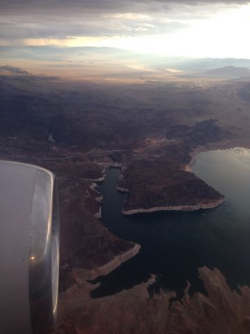 Boeing 737-700 — - Flying past the Hoover Dam and bypass bridge on our way home from Europe