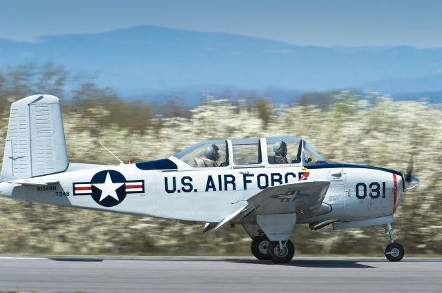 Beechcraft Mentor (N134RH) - Landing on Rwy 6, Clear, Calm, & 55°F. Spring has arrived in the Catawba Valley. 27.Mar.10.