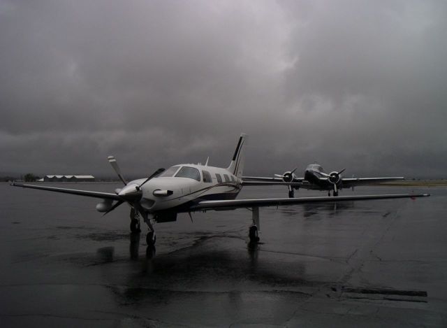 N46ME — - We just landed through that storm. It was actually a very smooth approach, just wet.