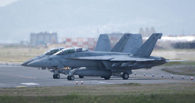 McDonnell Douglas FA-18 Hornet — - VFA-102 (Diamondbacks) holding short on bravo before taking of to Iwao Jima.