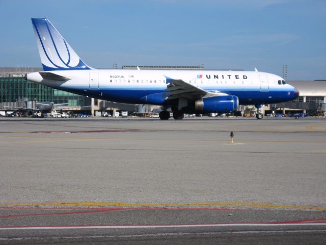 Airbus A319 (N802UA) - Holding on RWY 19R