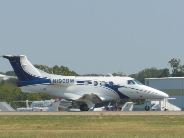 Embraer Phenom 100 (N190BW) - Embraer EMB-500 Phenom 100 (cn 50000028) N190BWbr /Dallas Love Field (DAL). Built in 2009 and owned by Woodward OK based oilfield services company BW Energy.br /Taken from Reeves Street, alongside Runway 13Lbr /2015 10 11   a rel=nofollow href=http://alphayankee.smugmug.com/Business-Jetshttps://alphayankee.smugmug.com/Business-Jets/a