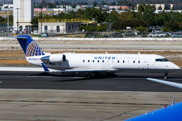 Canadair Regional Jet CRJ-200 (N979SW) - After a lengthy delay in Denver this SkyWest jet makes its way off the runaway for the gate