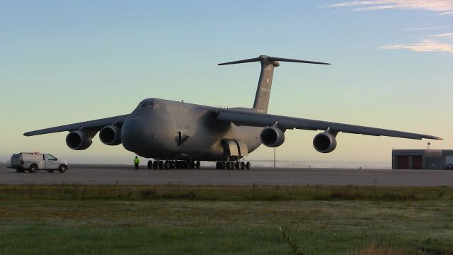 Lockheed C-5 Galaxy — - A Lockheed C-5M Super Galaxy descends its door after landing at Gander International.