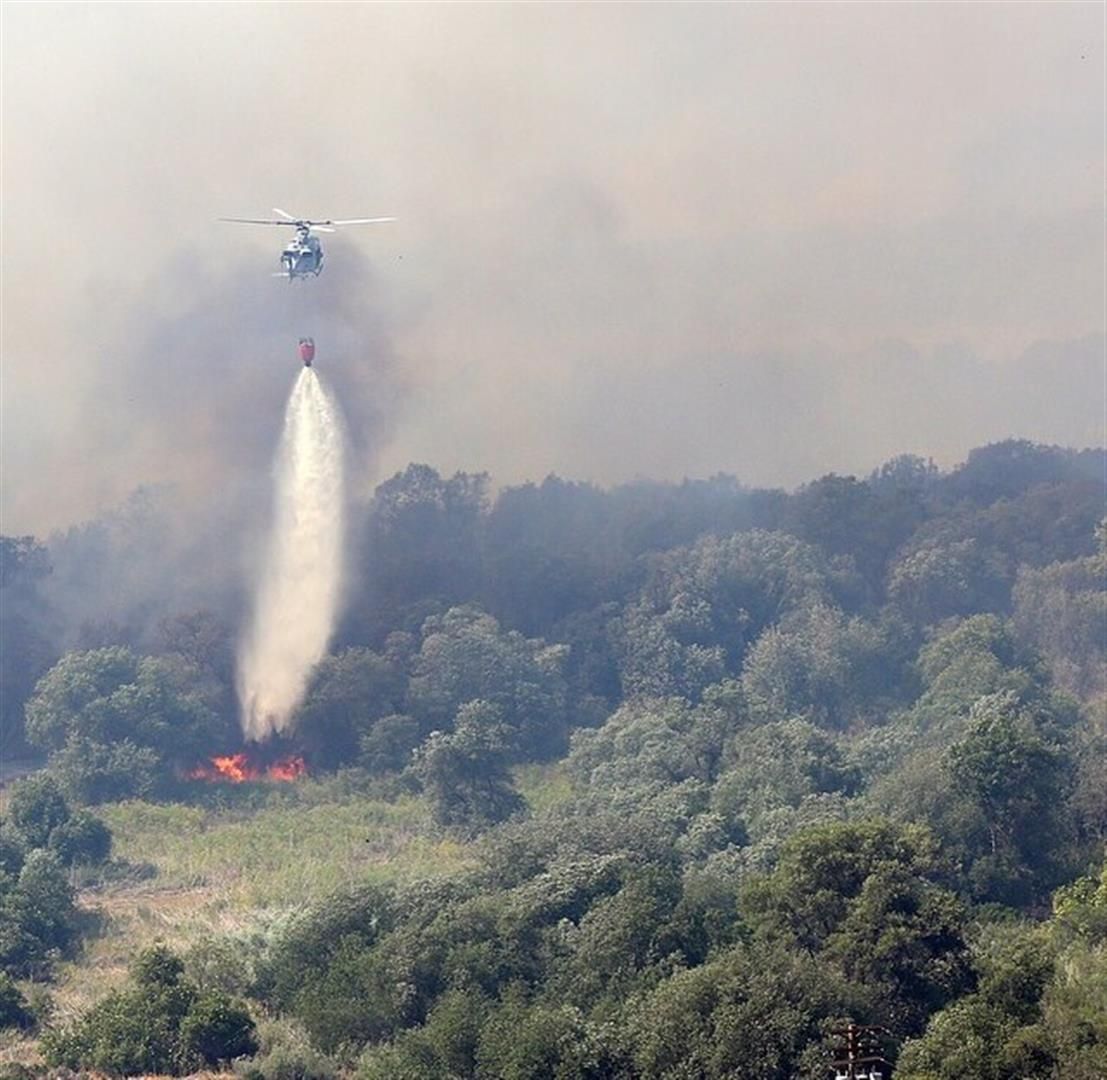 — — - USMC Camp Pendleton Helo's put into fire fighting action at request of Cal Fire. Huey's, CH-46's.