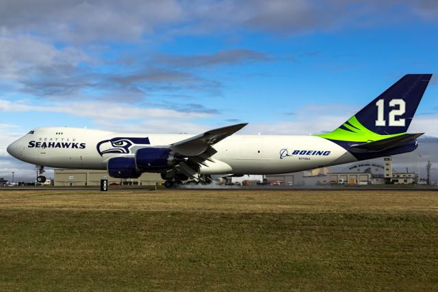 BOEING 747-8 (N770BA) - Boeing shows off Seattle Seahawks Superbowl run pride by painting N770BA in team colors.