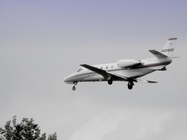 Cessna Citation Excel/XLS (N624QS) - A moment or two from landing this Citation Excel is shown here in the Spring of 2015.