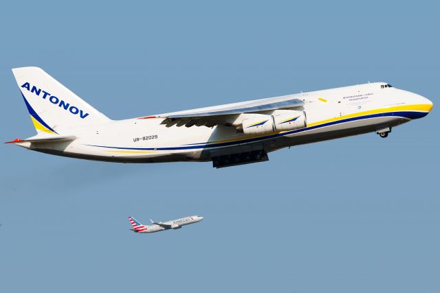 Antonov An-12 (UR-82029) - UR-82029 departing for LAX.  Part of a double Antonov event here at DFW 8/23/2018.  In the background AAL B738 N975AN  departs simultaneously for IND.