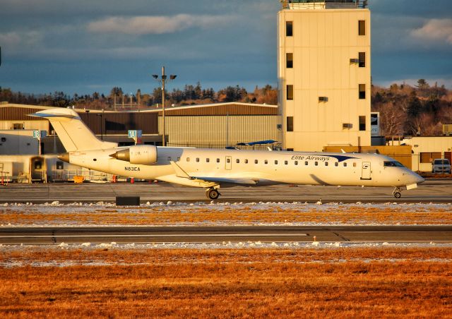 Canadair Regional Jet CRJ-700 (N83EA) - Golden hour! Ex Lufthansa Cityline RJ taxiing for a departure to Sarasota