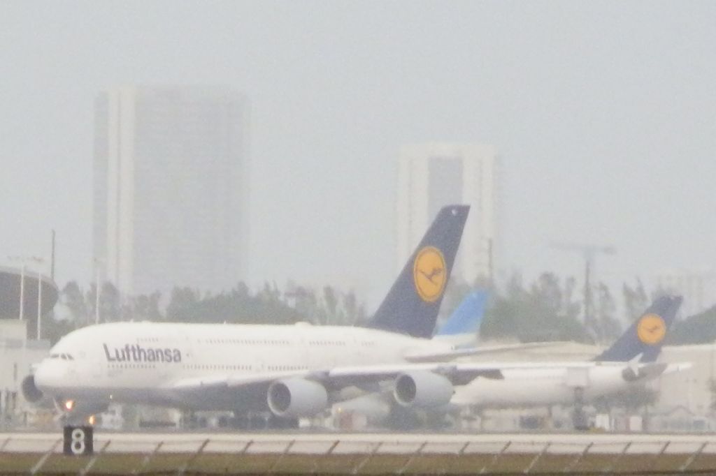 Airbus A380-800 (D-AIMC) - Flanked by a Lufthansa A330-300In the background!"Hazy Day!"